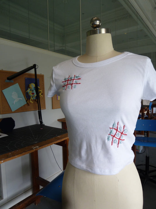 XOXO, Games Tee
